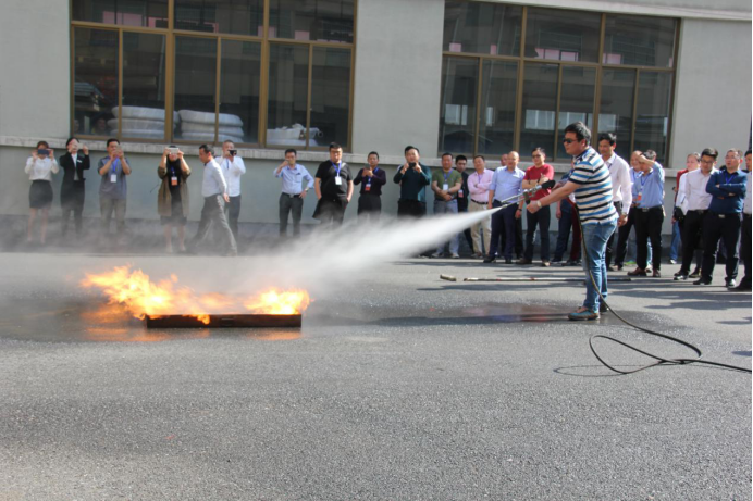 Guests Participate in Fire Extinguishing Drill